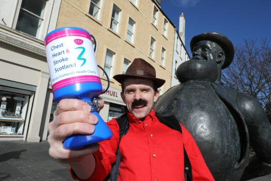 Lawrence Cowan, director of communications for Chest Heart & Stroke Scotland helps raise £30,000