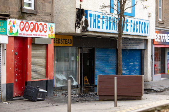 The damage to Furniture Factory after the fire.