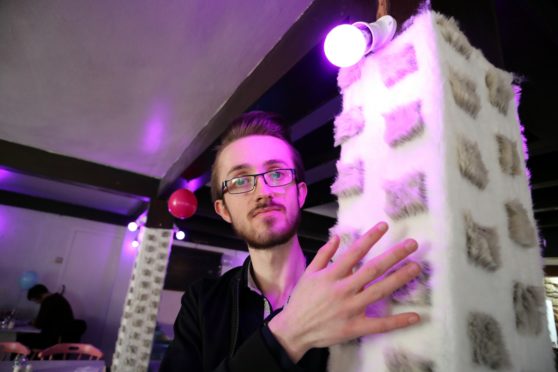 Trainee deputy manager Bradley Ramsay shows tactile pillars in autism-friendly Sensoriale