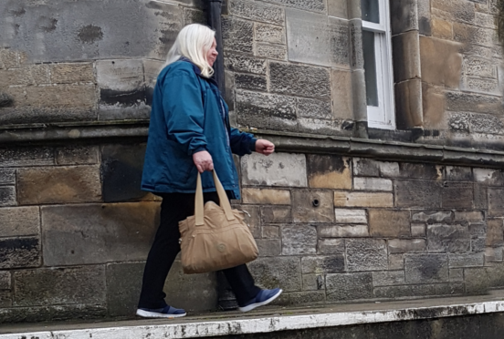 Joyce Hollywood arriving at Kirkcaldy Sheriff Court.