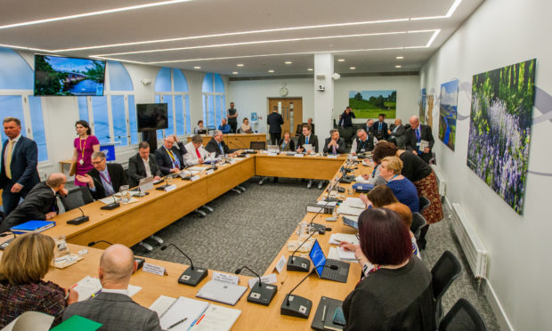 A meeting of the Lifelong Learning Committee in 2018