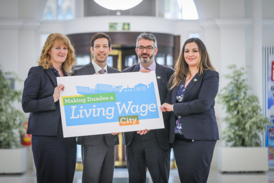 Cllr John Alexander, leader of Dundee City Council, Christine McGlasson, managing director of  Xplore Dundee, Ellis Watson, DCT Media, Lyn Anderson, Living Wage Scotland and Peter Kelly, director of the Poverty Alliance. ,