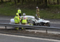 Police, Firefighters and Paramedics at work on the M90 motorway