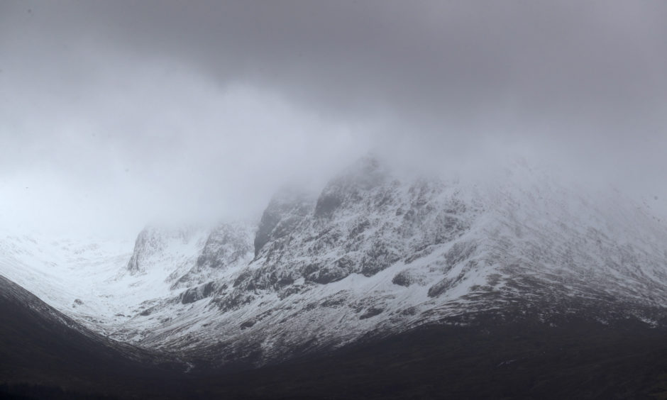 A view of the North Face of Ben Nevis mountain in Scotland. A young climber is being treated for serious injuries after an avalanche on the UK's highest mountain "wiped out" a climbing party, killing three of them.