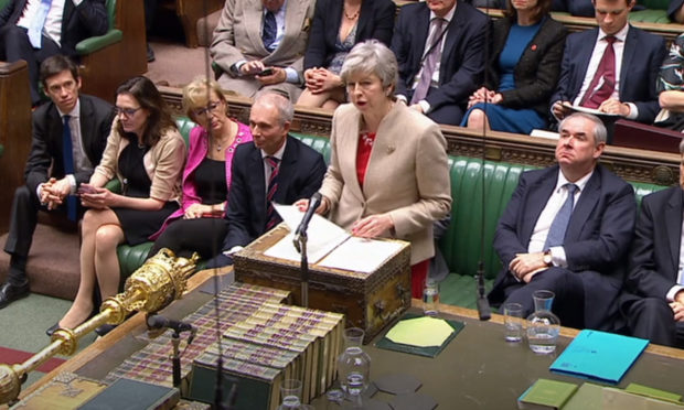 Prime Minister Theresa May speaks in the House of Commons during a Brexit debate.