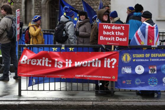 Anti-Brexit supporters on College Green in Westminster, London.