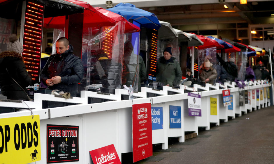 Bookmakers during Champion Day of the 2019. Simon Cooper/PA