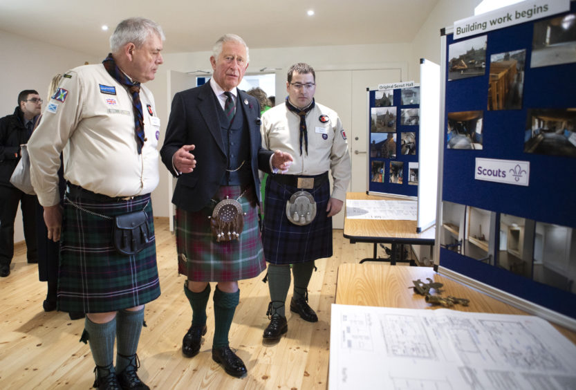 he Prince of Wales, known as the Duke of Rothesay while in Scotland, meets members of the community during a visit to the newly refurbished 1st Macduff Scout Hut in Macduff, Aberdeenshire.