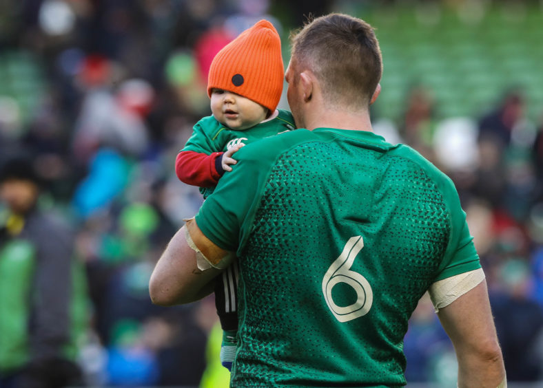 Ireland's Peter O'Mahony and his son Theo after the Guinness Six Nations match at the Aviva Stadium, Dublin..