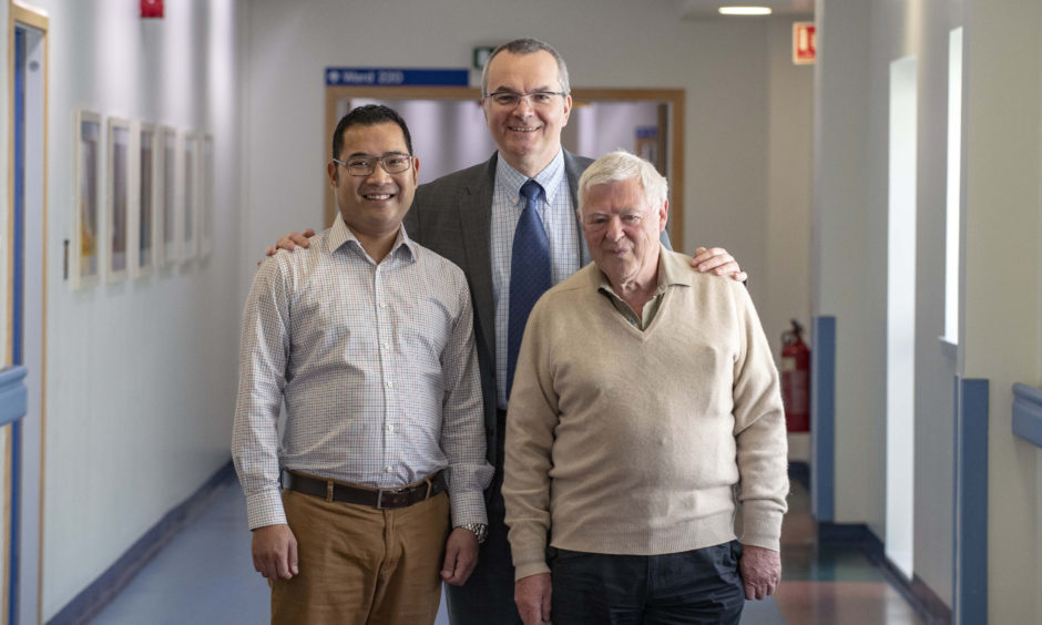 Gabriel Oniscu, (centre) the consultant transplant surgeon at Edinburgh Royal Infirmary (ERI) and kidney donor John Fletcher, 72, from Auchtermuchty in Fife (right) with recipient Mathew Catlow (left) at the Edinburgh Royal Infirmary as they mark the 10th anniversary of the first altruistic kidney donor in Scotland.