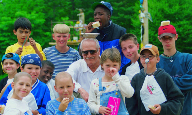 Paul Newman with some of the youngsters at the camp.