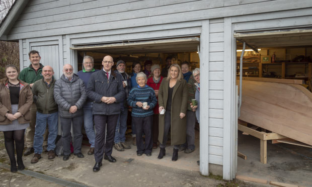 MSP John Swinney meets volunteers at Loch Tay