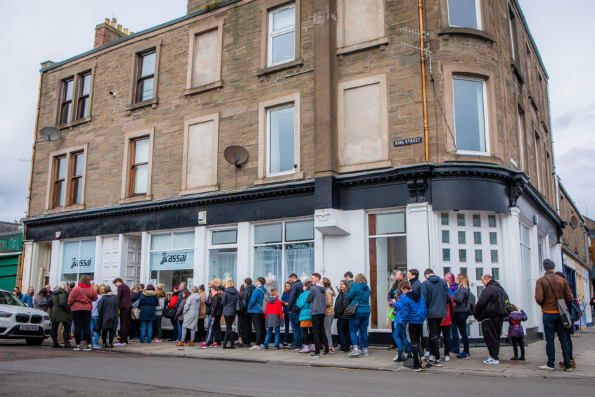 The queue of fans to see Tom Walker at Assai Records.