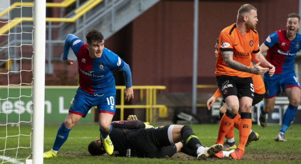 Benjamin Siegrist is floored as Aaron Doran scores the winner.