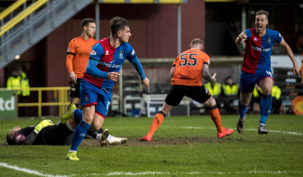 Aaron Doran, left, turns away to celebrate scoring the winner for Inverness.