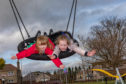 Youngsters Ruby Gardner and Lucy Hutchison, of Locheem, Dundee, on the swing