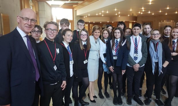 Perth Academy students meet John Swinney and Nicola Sturgeon at the Hand of Glove exhibition in Holyrood