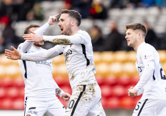 Dundee United celebrate Nicky Clark's equaliser.