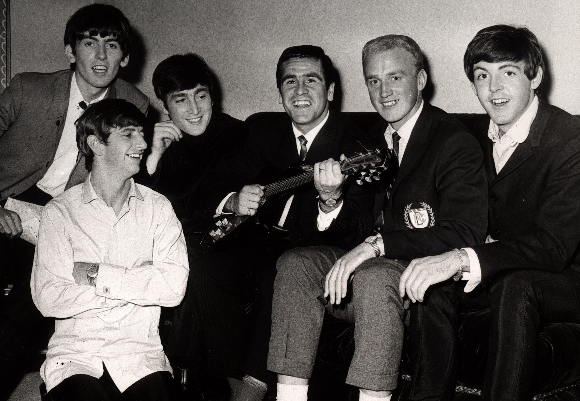 THe Beatles meet Dundee FC players Hugh Robertson and George Ryden on their 1963 visit to Dundee.
