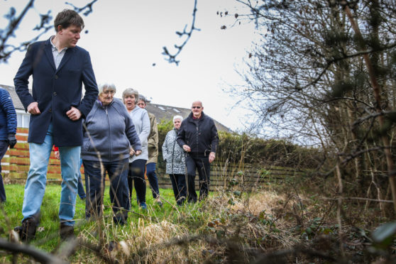 Local Lib Dem councillor James Calder with residents who have raised concerns about the burn.