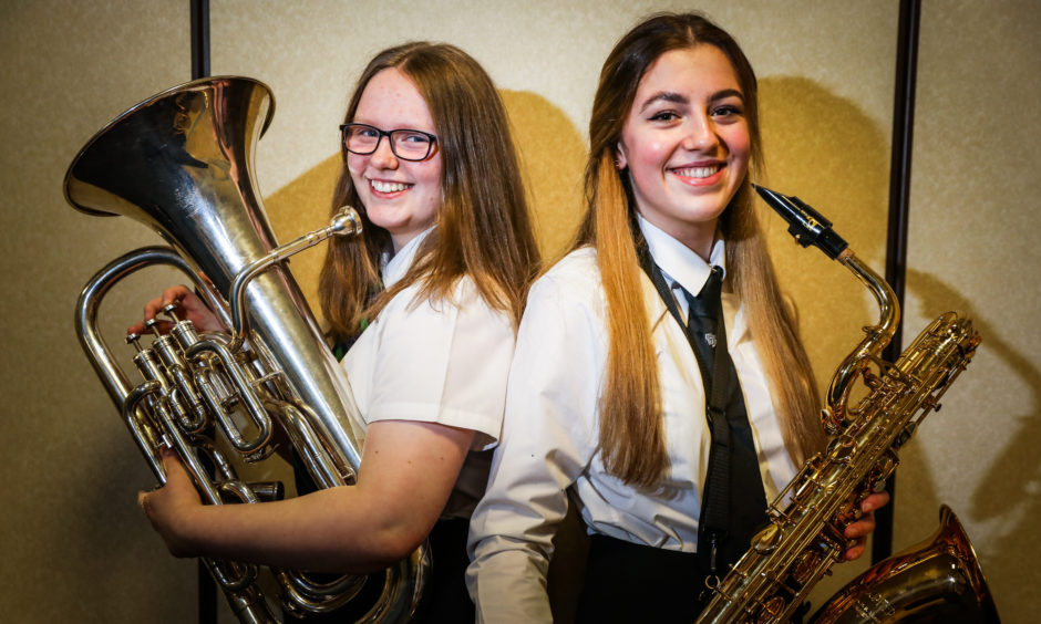 Sarah White, 14 from St Pauls and Molly McGeoghie, 16, from Baldragon wait to play in the Senior Wind Ensemble.