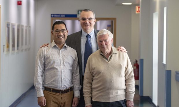 John Fletcher with transplant surgeon Gabriel Oniscu