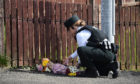 Police attend the scene of a shooting, in which journalist Lyra McKee was killed, on Fanad Drive on April 19, 2019 in Londonderry, Northern Ireland.