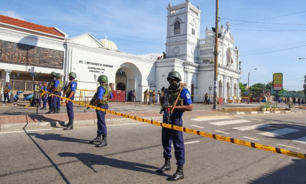 Sri Lankan soldiers stand guard in front of the St. Anthony's Shrine a day after multiple explosions targeting churches and hotels across Sri Lanka, in Colombo, Sri Lanka.