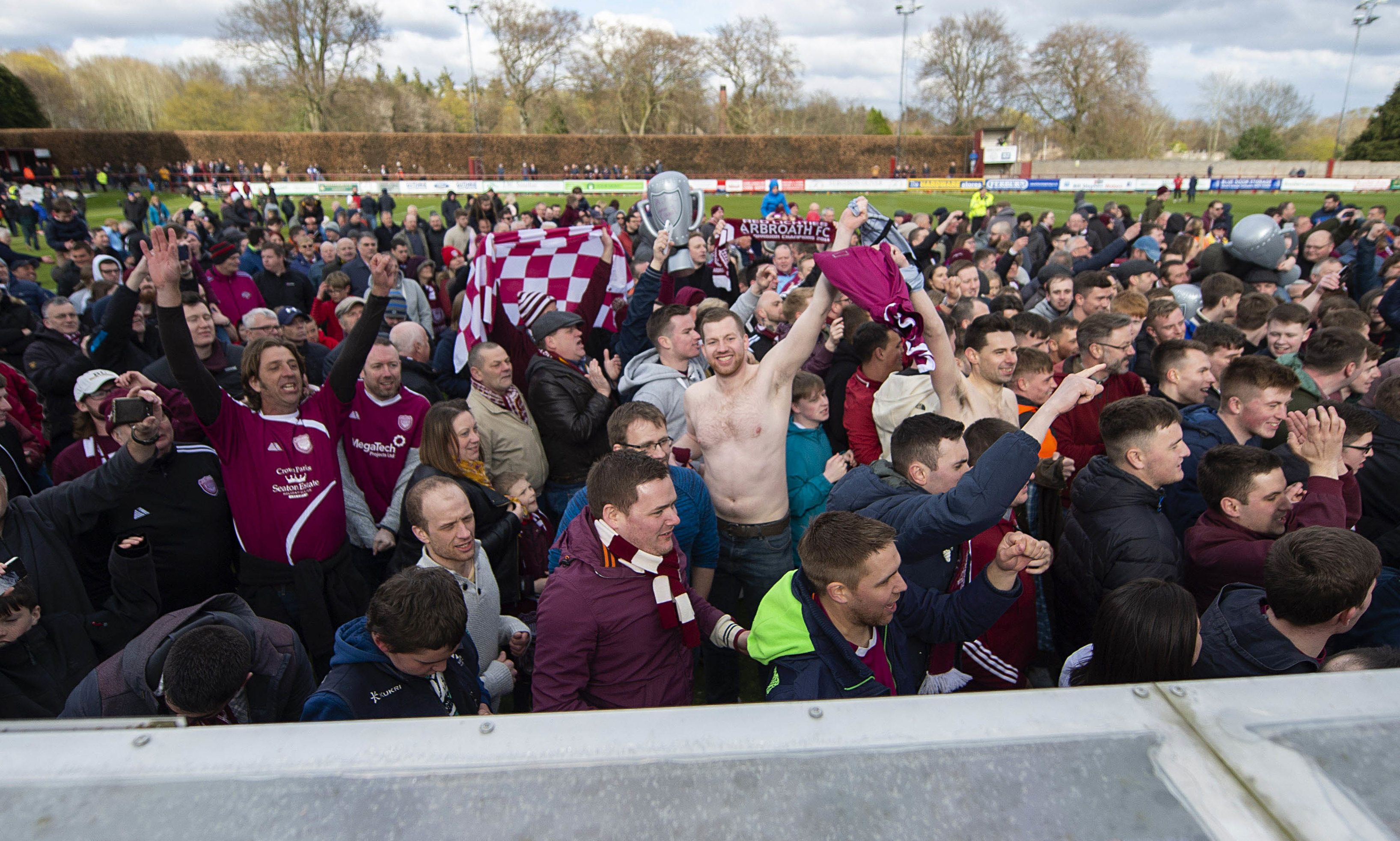 Arbroath fans celebrated on the pitch