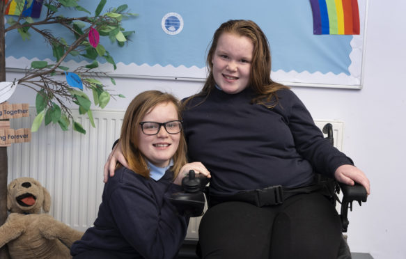 Ayley (left) with her sister Chloe.