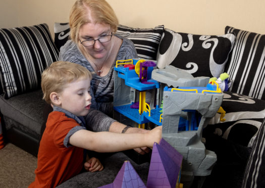 Thain (4) with his mum Jen Torrie.