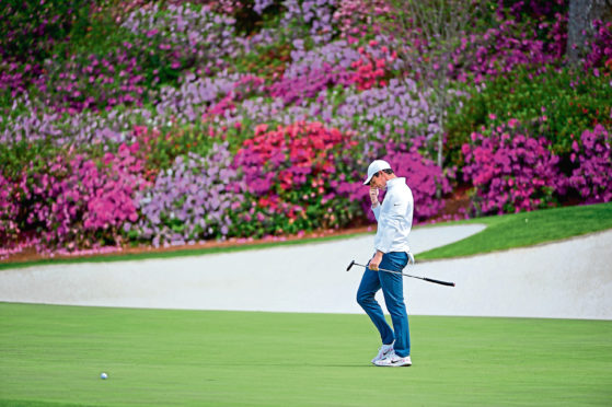 Rory McIlroy of Northern Ireland plays on No. 13 green during the final round of the Masters at Augusta National Golf Club, Sunday, April 8, 2018. (Photo by Charles Laberge/Augusta National via Getty Images)
