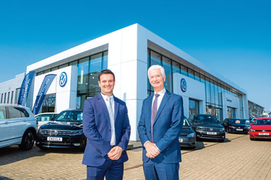 Director Jamie Cameron and chairman Douglas Cameron of Cameron Motor Group.