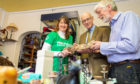 Gillian Morris (MacMillan), MSP John Swinney and (Director) Joe Richards in the new Re-Use Shop in Coupar Angus.