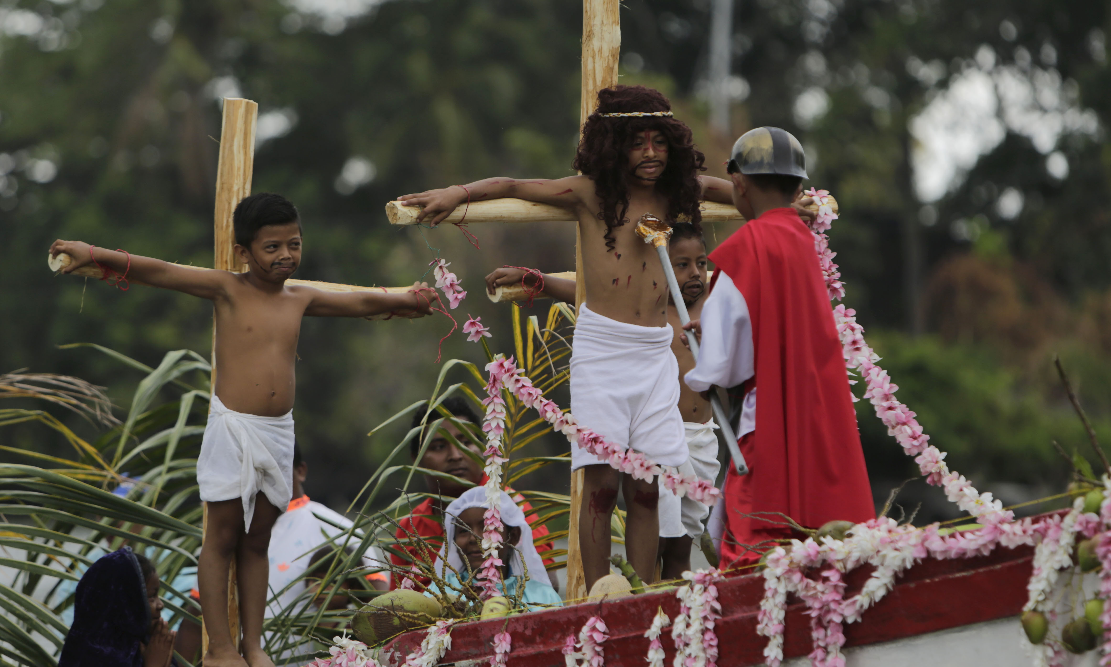 Catholic children take part in an aquatic re-enactment of the Way of the Cross on Lake Cocibolca, or Lake Nicaragua, in Granada, some 48 km from Managua..