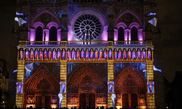 Sound and light show at Notre Dame de Paris cathedral, France.