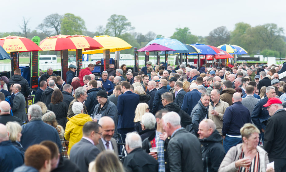 Busy at the betting stalls.