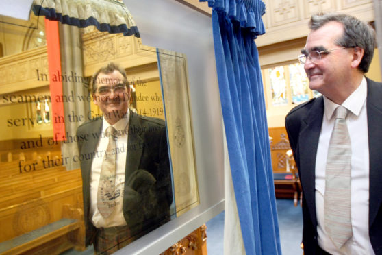 Hugh Macrae with the memorial in St Mary's.