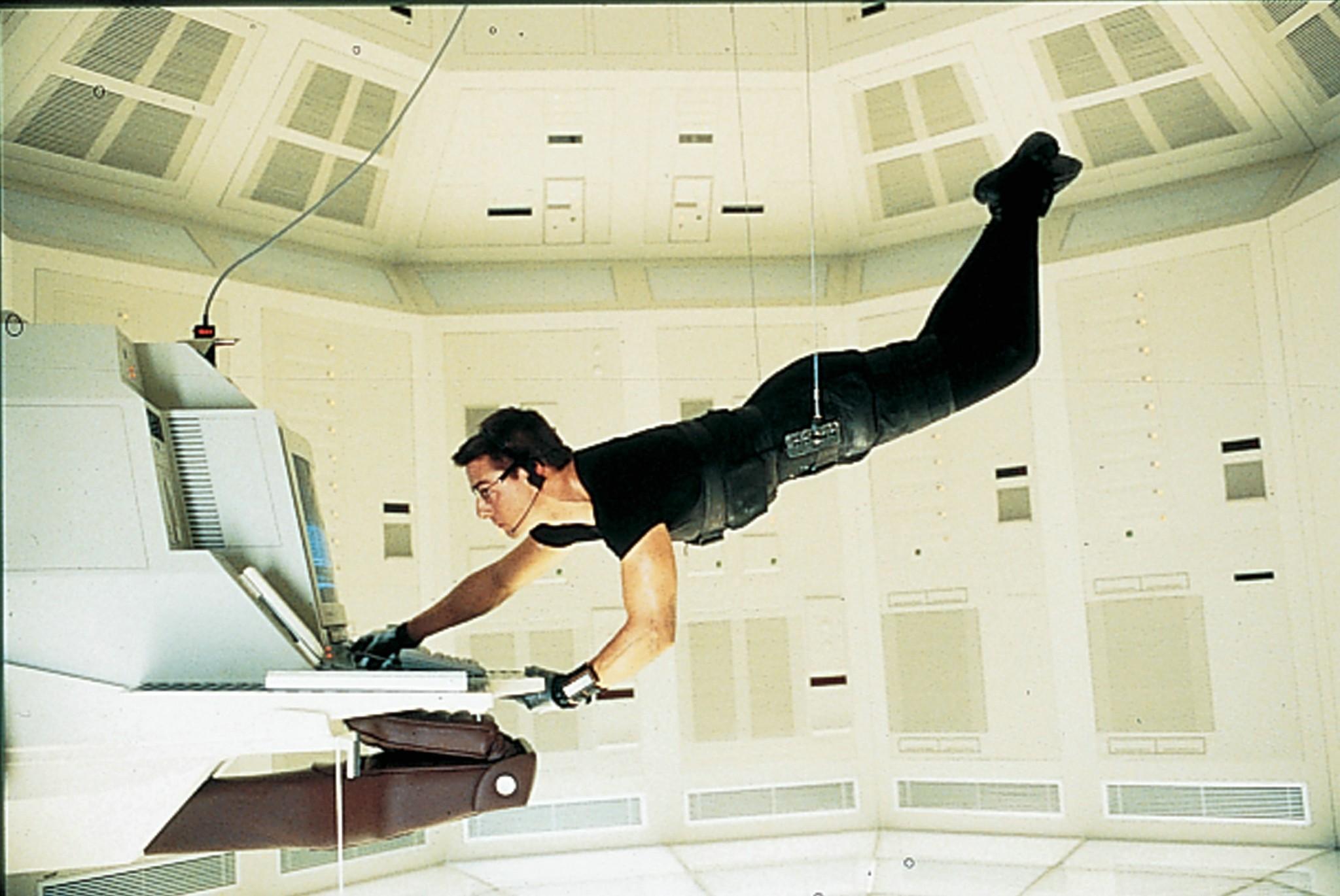 Tom Cruise in Mission Impossible.
