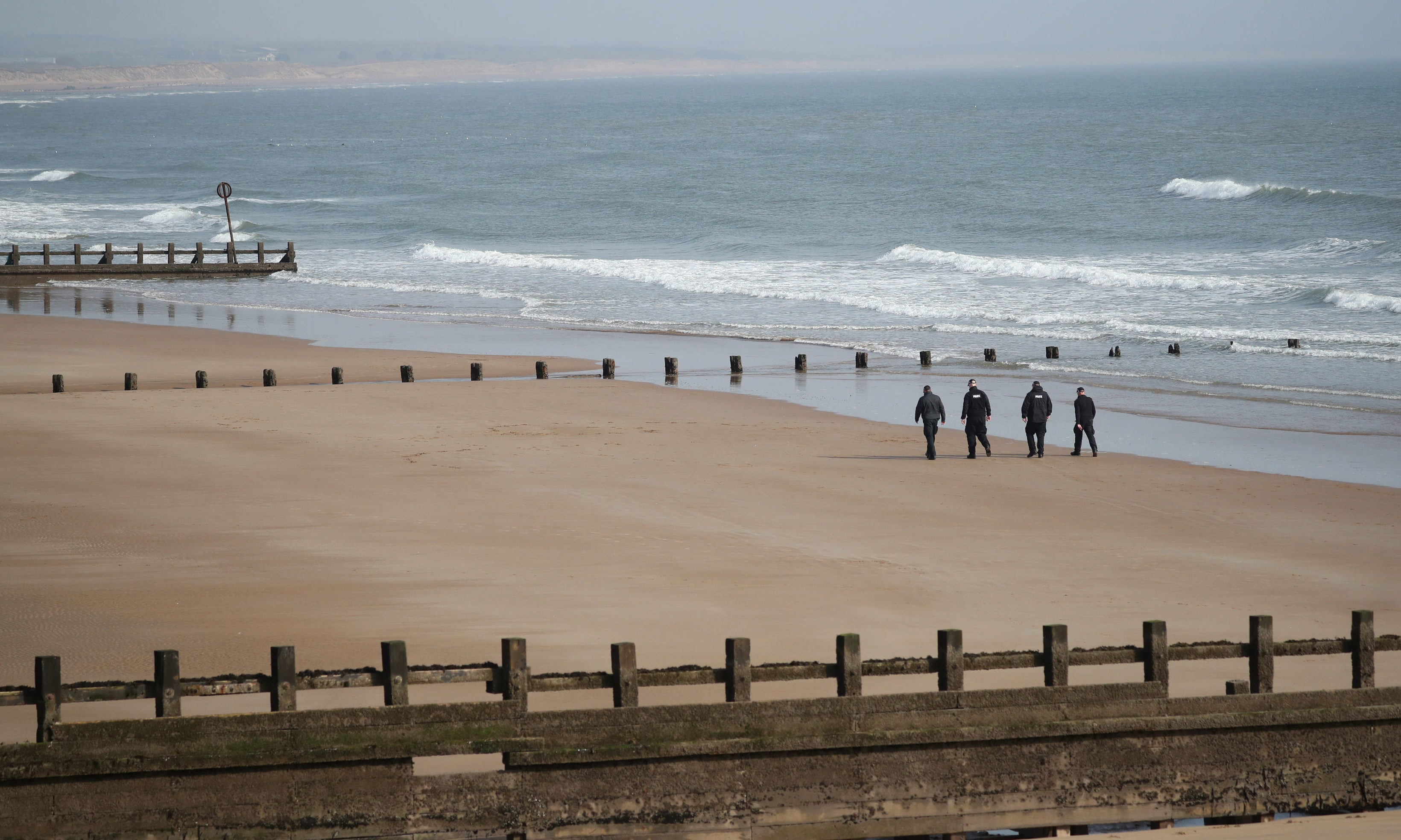 Police search Aberdeen beach.