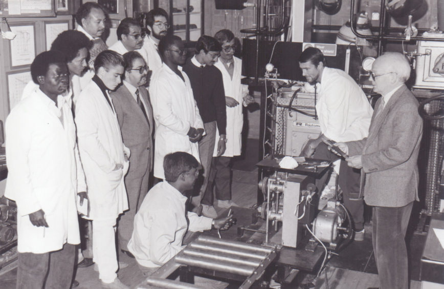 Demonstration of machinery at Dundee Institute of Technology to overseas visitors, c. 1988