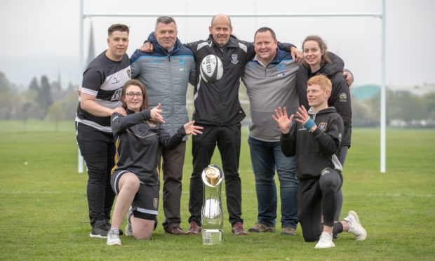 Back Row L to R Calum Robertson (Perthshire Rugby) Andy Cummins (Regional Manager Scottish Rugby), Eamon O'Brien (Head of Midi Section Perthshire Rugby) Mark Salter (Caledonian Regional Competitions administrator) and Sarah Hogwood (Assistant Development Officer Perthshire Rugby).
Front Row L to R Players Georgina Adams and Aidan Watson.