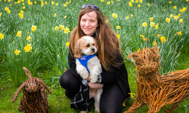 Katie McCandless-Thomas with her dog Baxter.