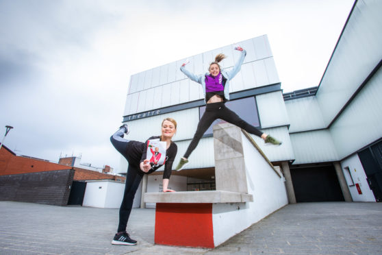 Dancers Danielle Tyrer and Siobhan Marshall unveil the new season brochure at Perth Theatre.