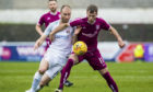Danny Denholm (right) going up against Montrose's Sean Dillon in his Arbroath days.