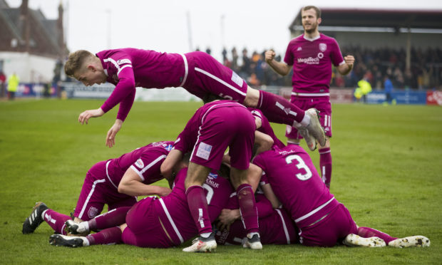 Arbroath players celebrate.