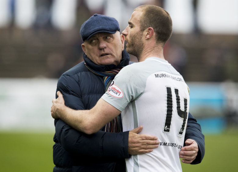 Arbroath manager Dick Campbell with Montrose's Sean Dillon at full-time