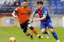 Aaron Doran, right, in action with United frontman Nicky Clark.