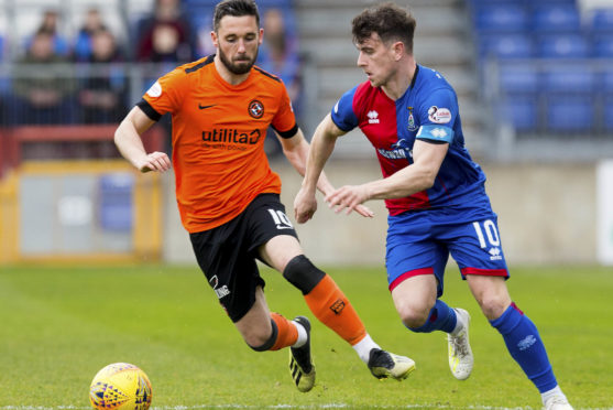 Aaron Doran, right, in action with United frontman Nicky Clark.