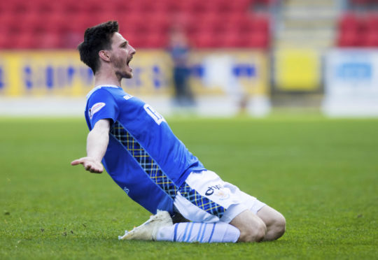 Scott Tanser celebrates his goal.